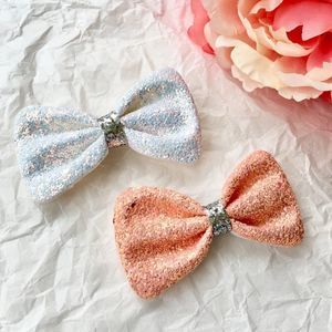 Set Of 2 Glittery Peachy & White Bow Hair Clips